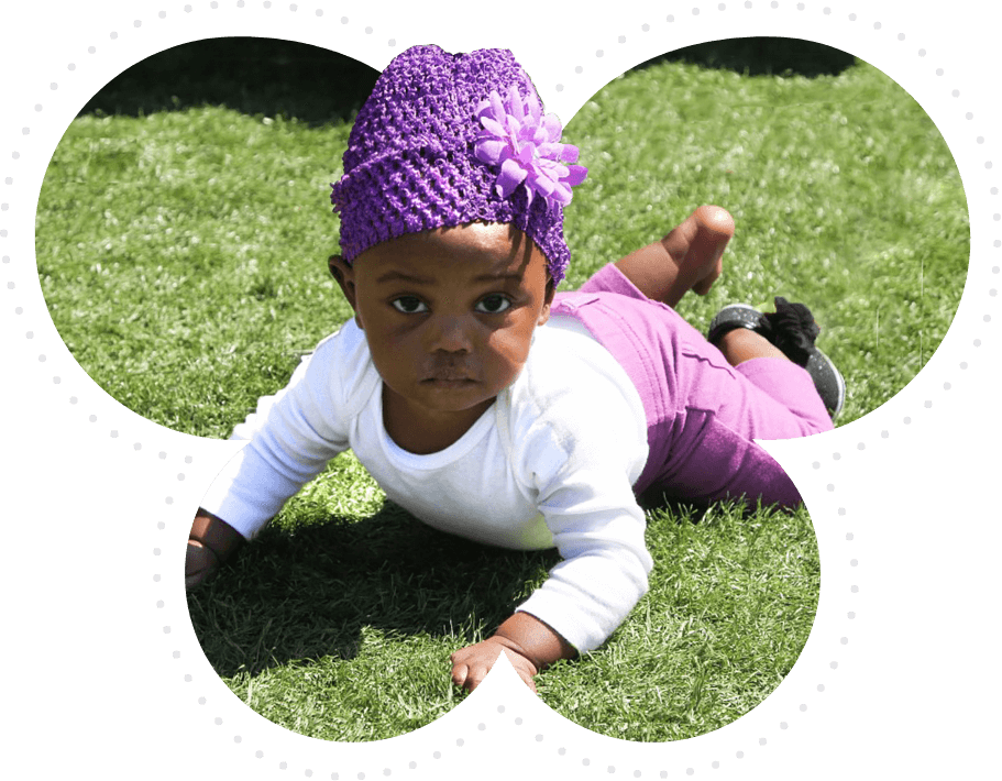 Toddler in a purple attire